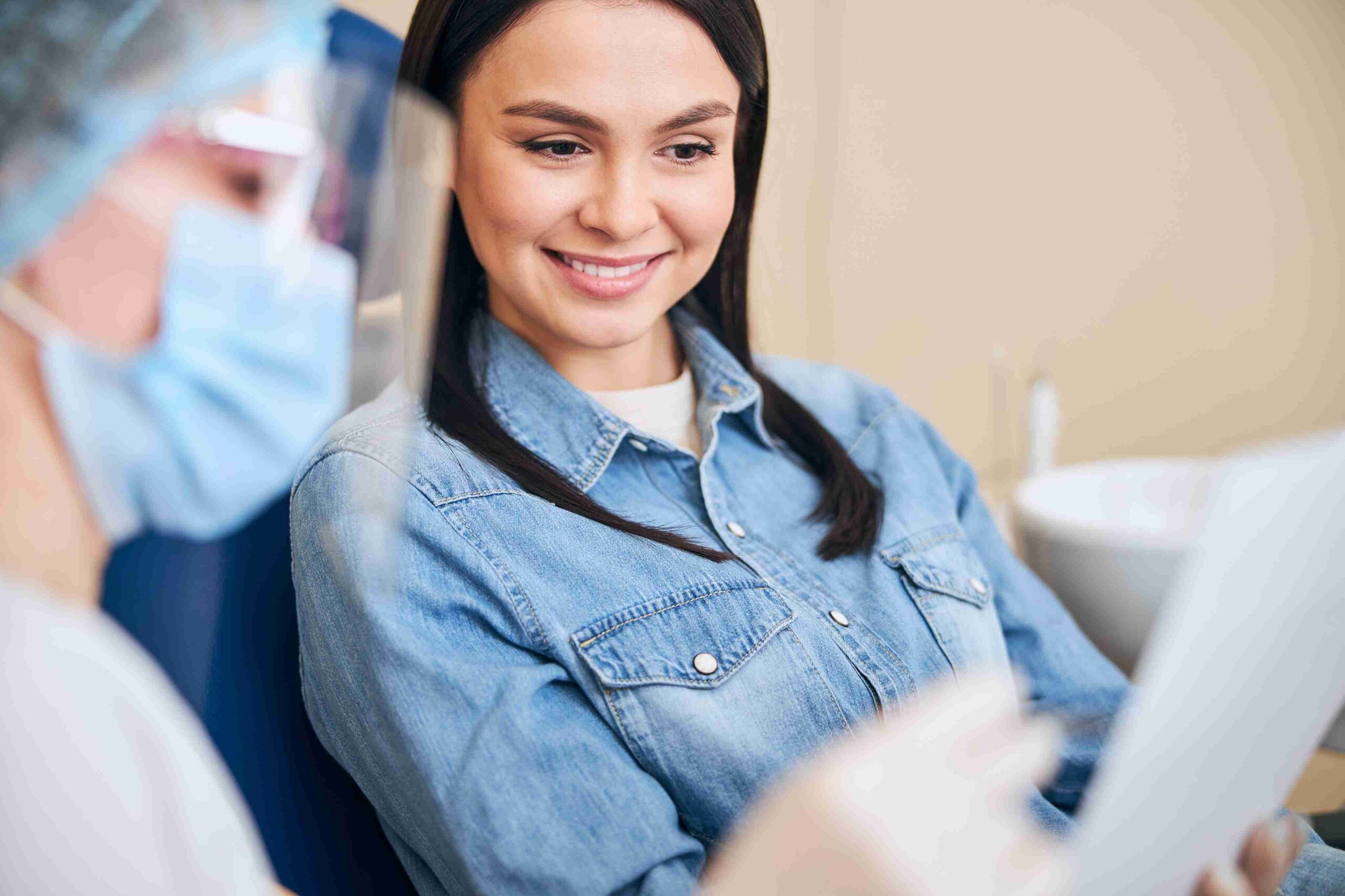 Patient reviewing information with a dental professional.