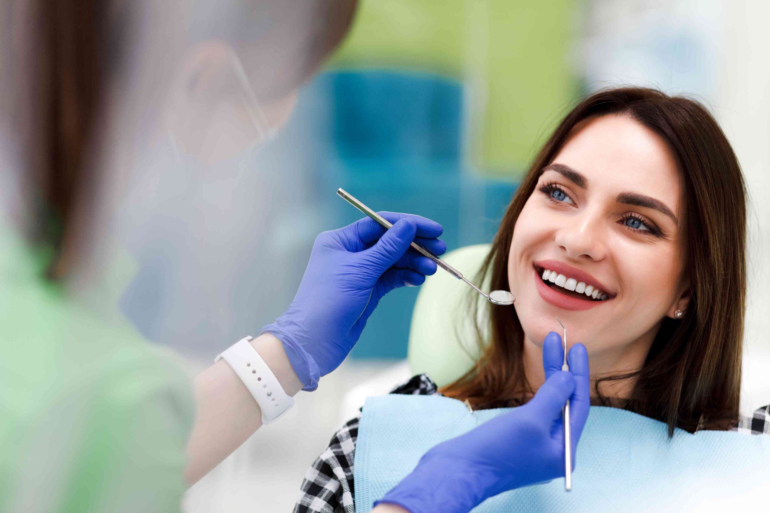 Smiling patient during a dental exam.