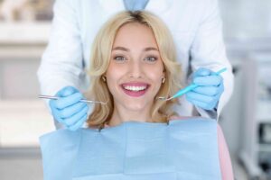 Smiling patient during a dental visit.